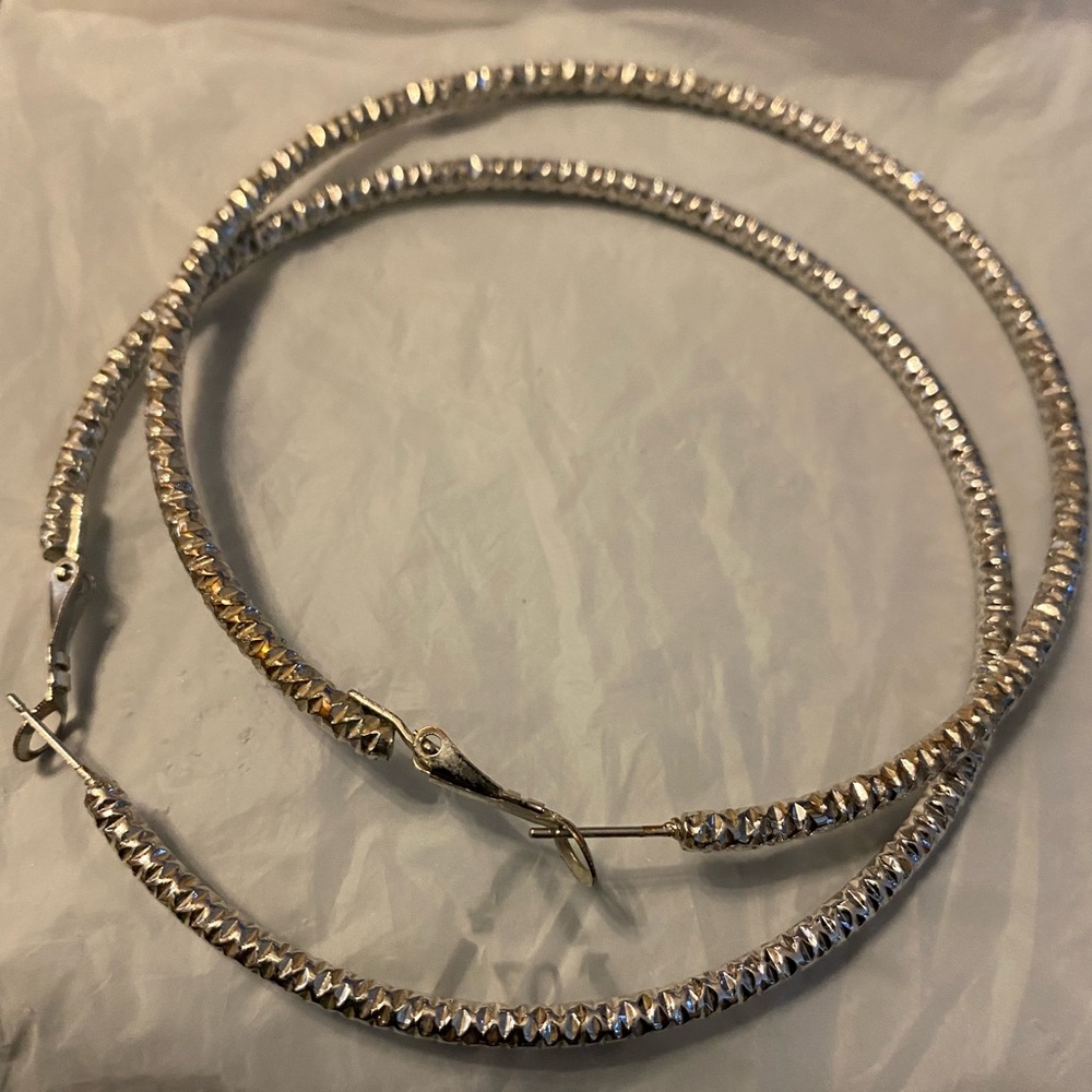 Cosmetic silver earrings